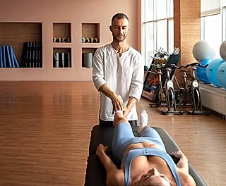 Certified Tattva Spa healer providing professional massage therapy, ensuring safe and effective relaxation treatments.