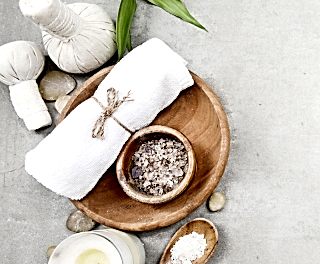 Tattva Spa commitment to hygiene with neatly arranged towel, herbal salts, and sanitized spa essentials for a safe wellness experience.