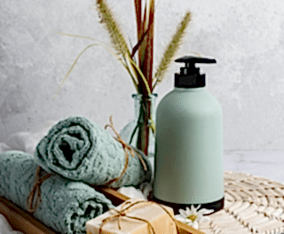 Tattva Spa quality products including natural soap, fresh towels, and premium skincare essentials for a luxurious wellness experience.
